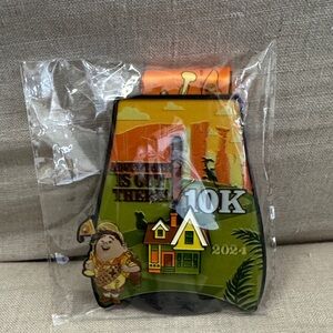 Disney Adventure 10K Medal with Orange and Green Accents